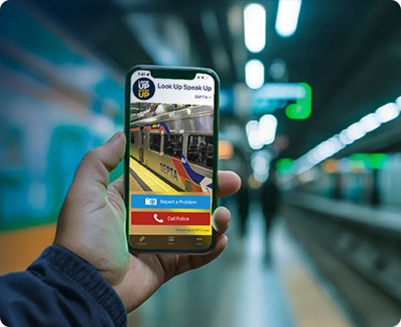 A Look Up Speak Up app user on the subway.